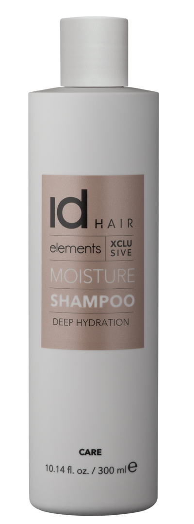 Hvid beholder med bronze logo. Id Hair Elements Exclusive Moisture Shampoo