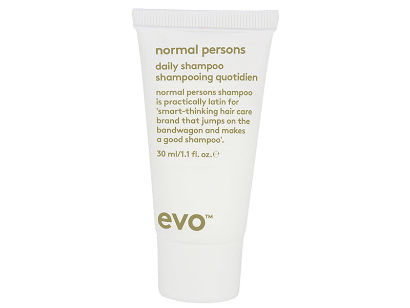 Hvid beholder med grønt logo og skrift. Evo Normal Persons Daily Shampoo