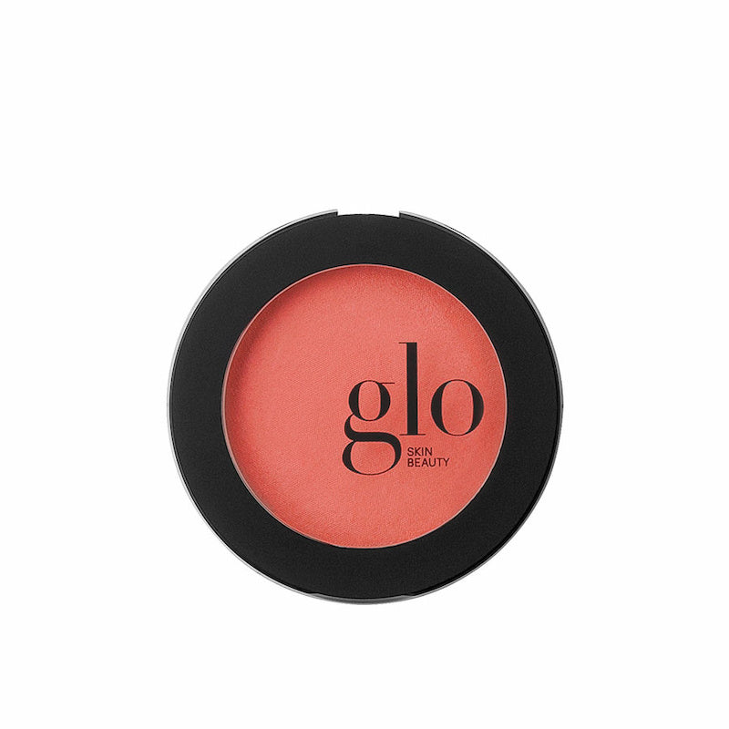 Sort dåse med gennemsigtig cover og rige farver. Glo Blush - Papaya