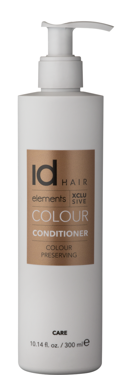 Hvid beholder med pumpe og guld logo. Id Hair Elements Xclusive Colour Conditioner.