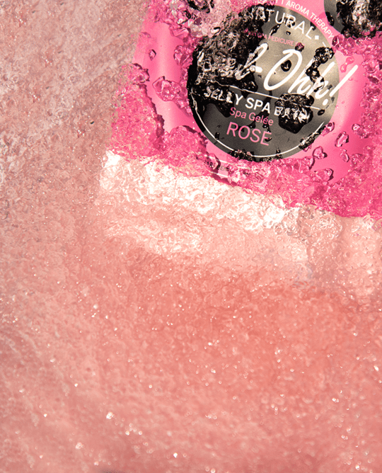  Gel-Ohh Jelly Spa Pedi Bath - Rose, sænket ned i vand.